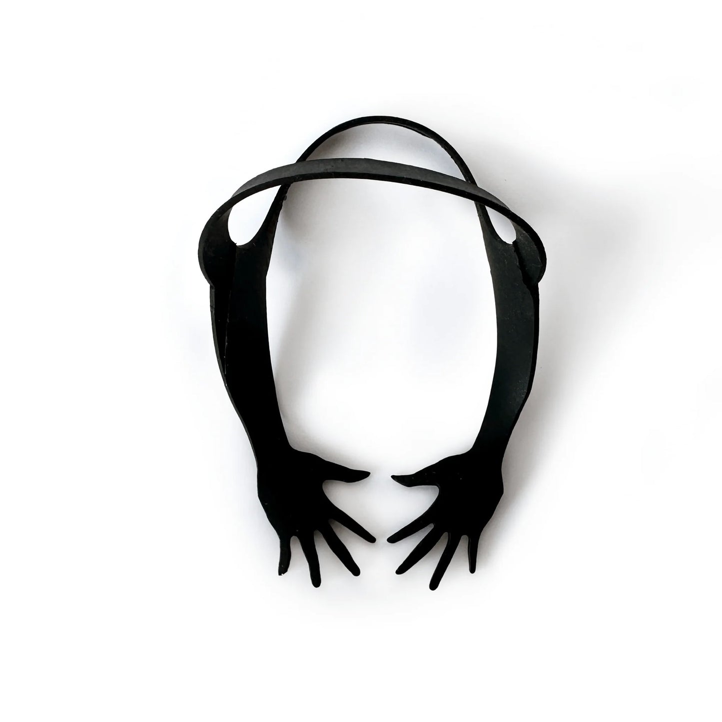 Fun and functional rubber bands in the shape of hands - socially made in Switzerland by taet tat of used bicycle tubes