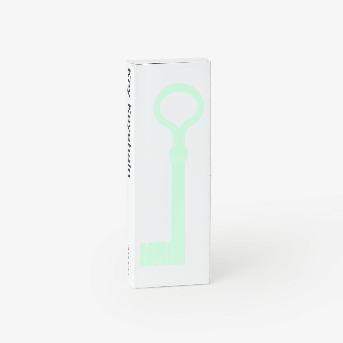 key chain designed by designer Harry Allen in the shape of an old Italian Palazzo key, made of silicone, with glow in the dark effect