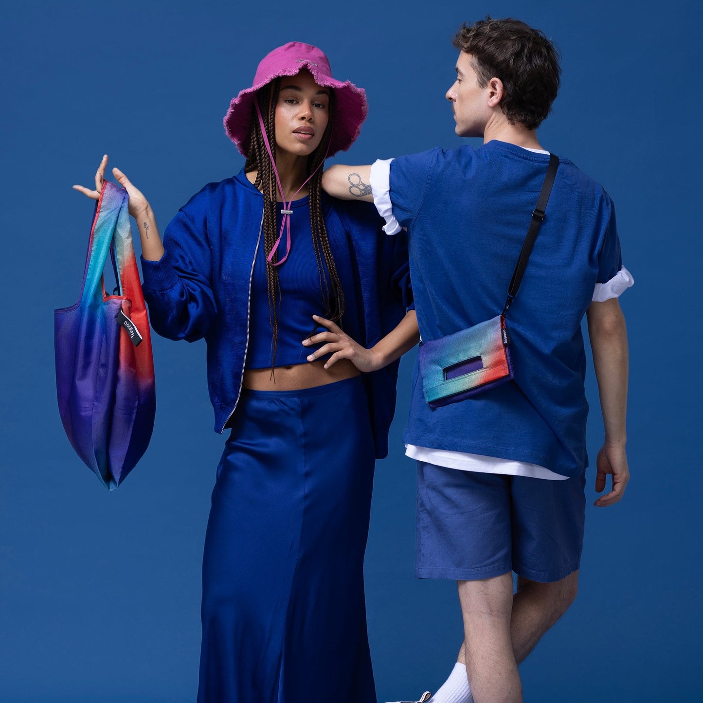 Stylish and functional crossbody bag – made of recycled material, adaptable design, and unfolds for extra space.