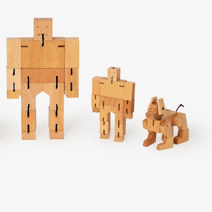 Poseable Cubebot robot—clever fun for young minds and adult desks.
