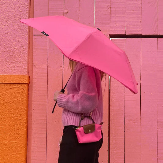 Foldable umbrella for rain and shine - stormresistant, sturdy and repairable. Innovative design to last a lifetime. The best umbrella you have ever had.