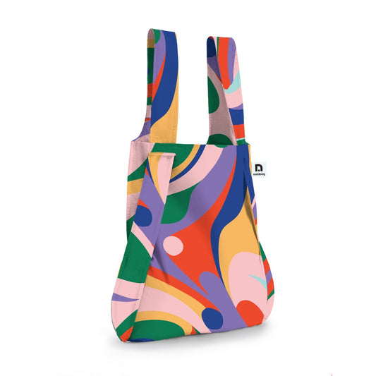 Foldable bag and backpack in beautiful pattern and warm colors - flow from notabag