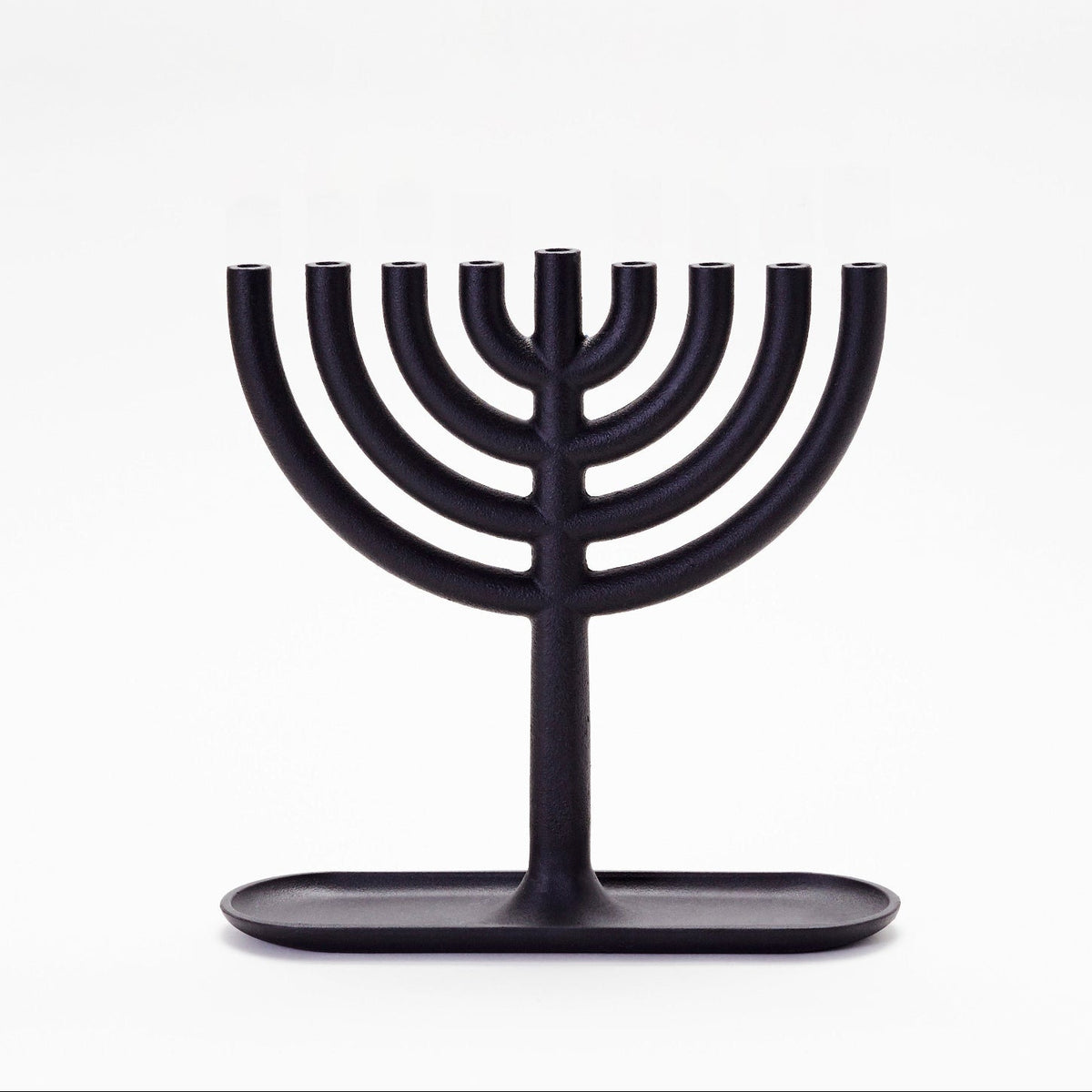 Cast iron menorah designed by Josh Owen - minimalist design - the Helvetica of menorahs
