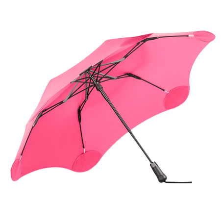 Foldable, compact umbrella that provides unparalleled protection against heavy rain and gusts of wind - stylish, reliable and built to last - metro pink