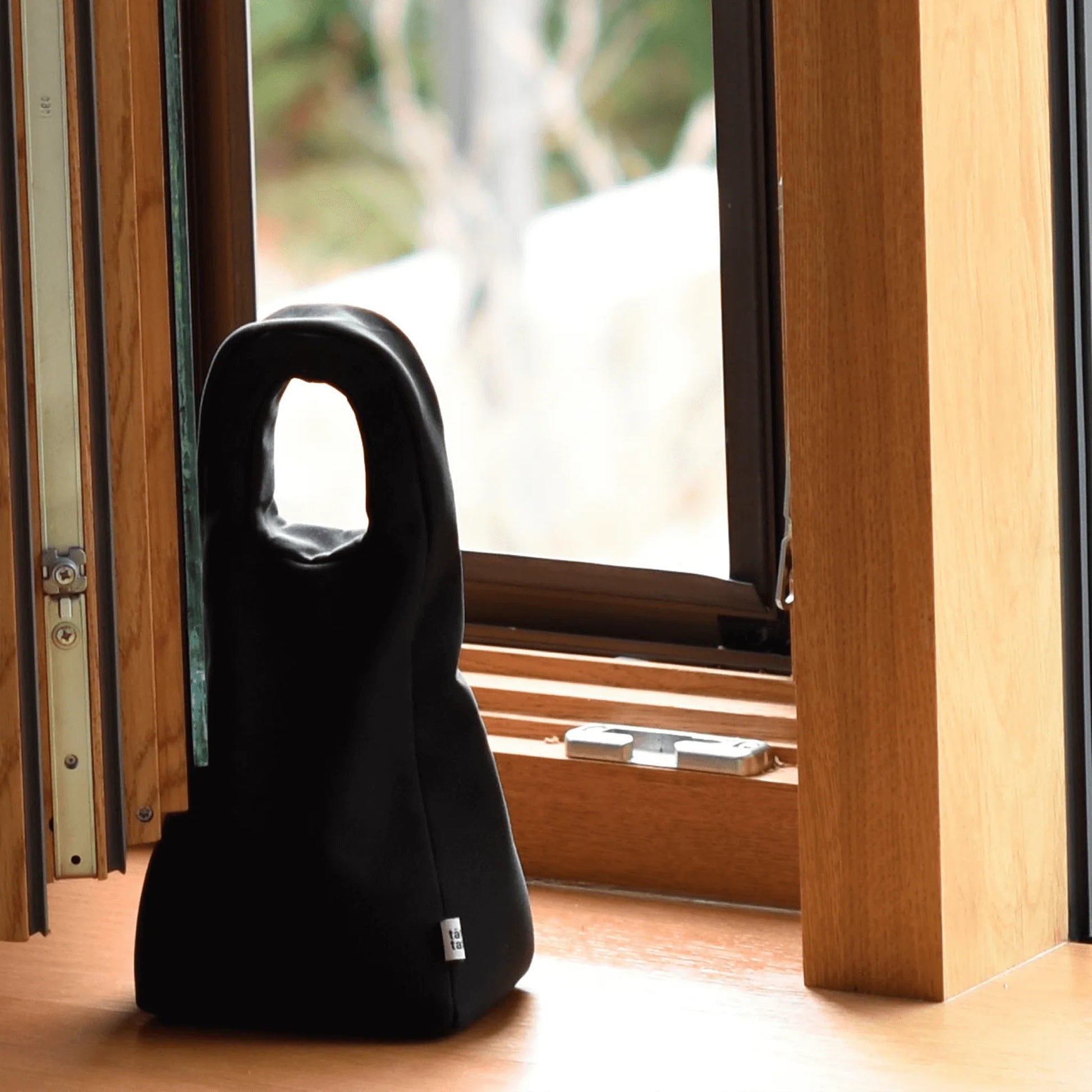 taet tat door and window stopper black