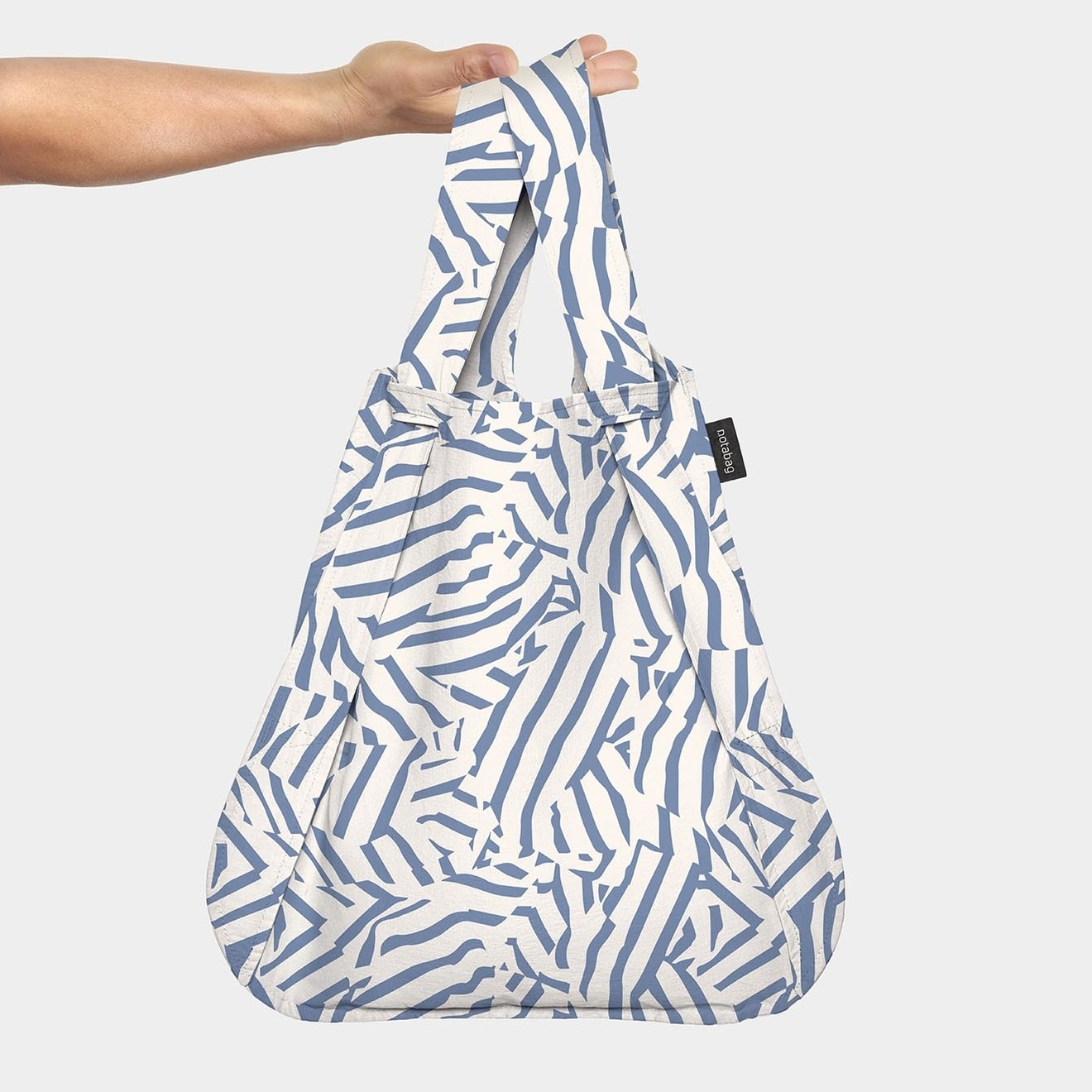 Notabag blue twist foldable handbag backpack